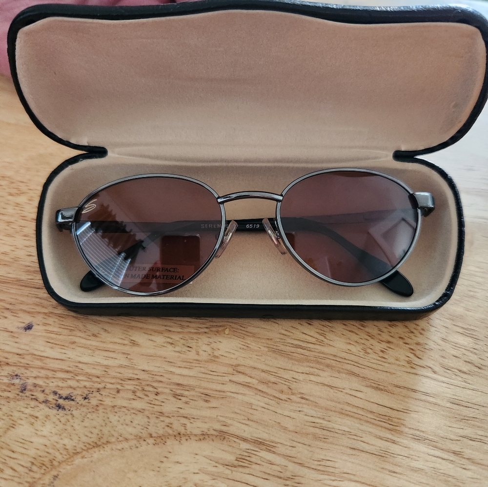 AUTHENTIC LIKE NEW PRE-OWNED SERENGETI SUNGLASSES/CASE..MINT CONDITION 50.00